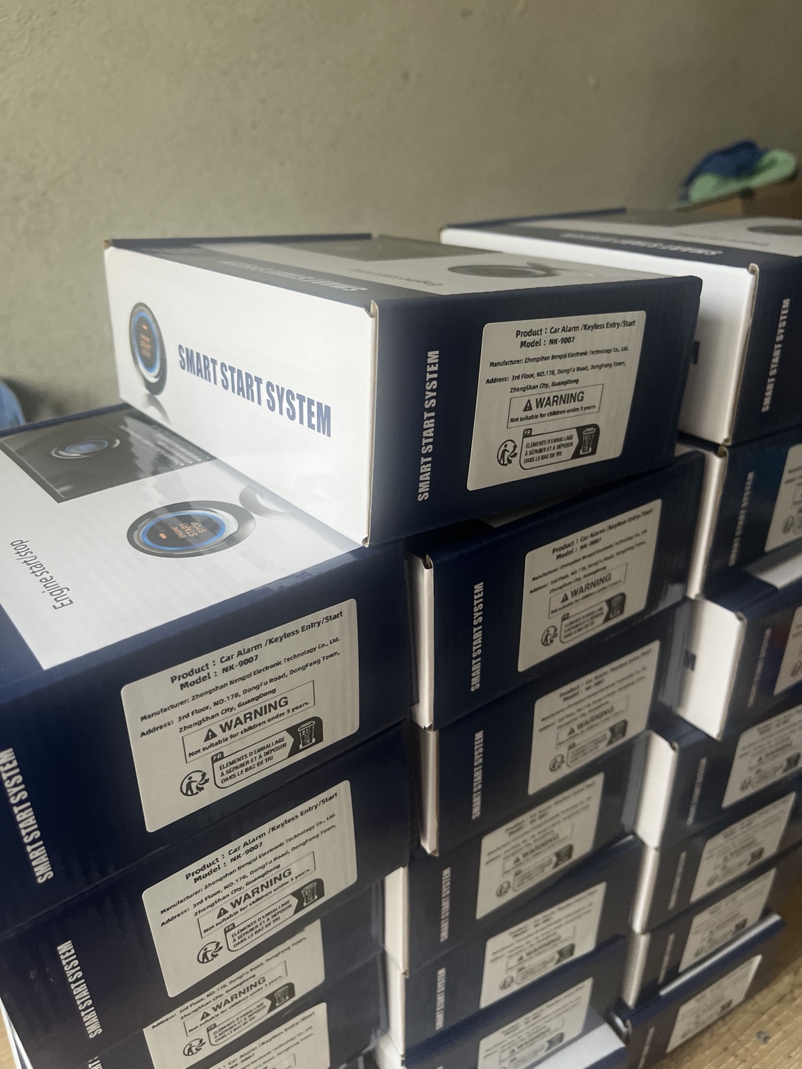 Stacks of EFHIPS smart start system retail boxes ready for shipment