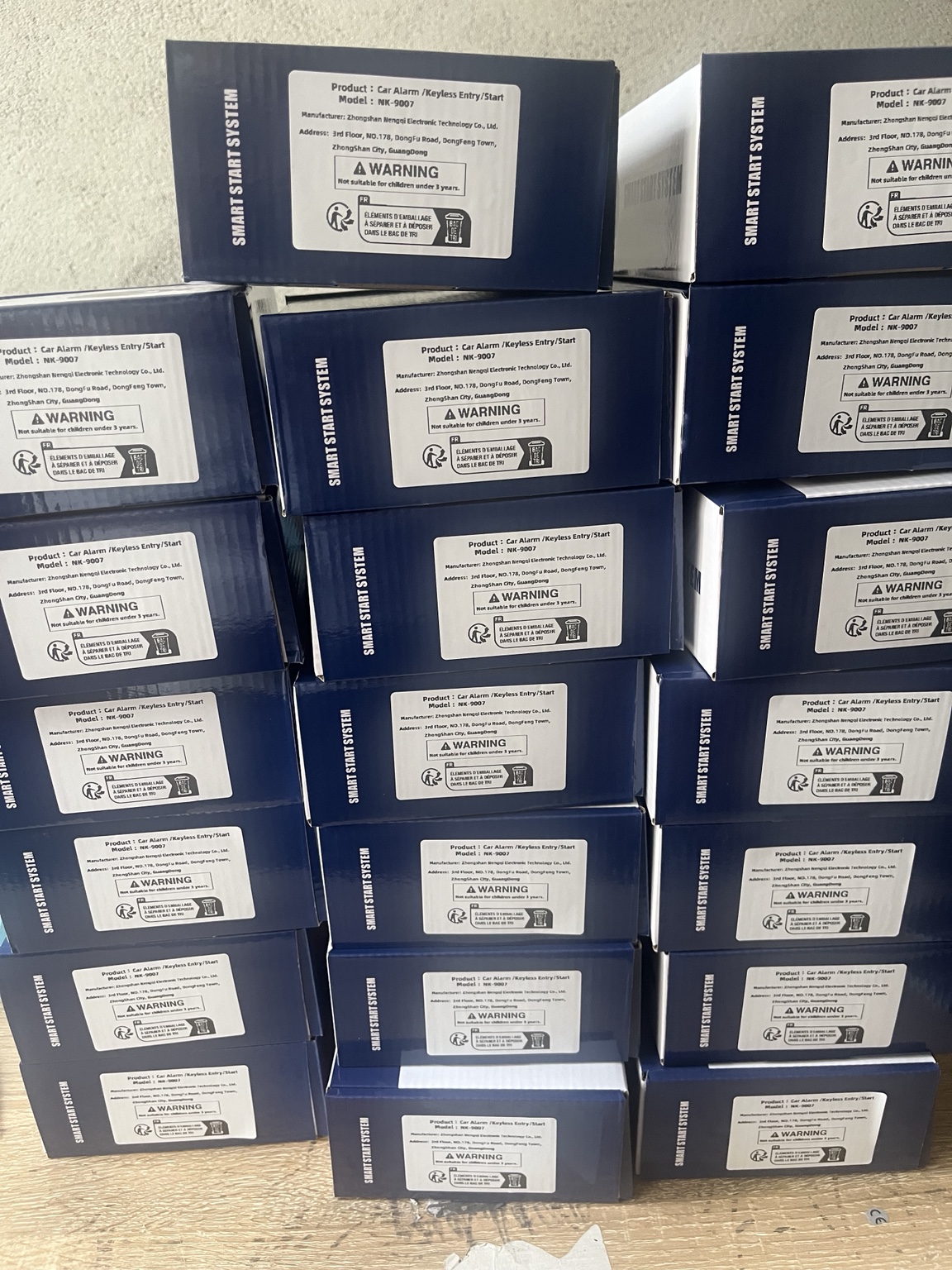 Large batch of EFHIPS smart start system boxes stacked in rows