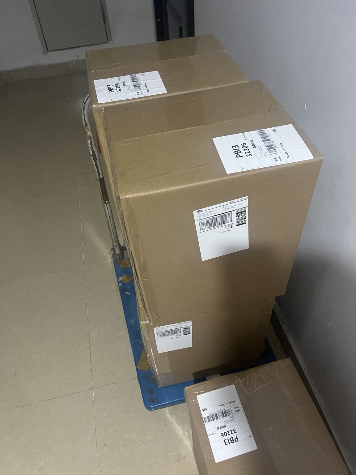 Large shipping cartons with labels prepared for outbound shipment